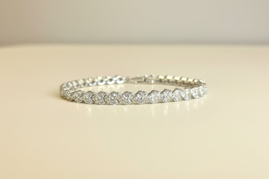 ORENTINI 18K White Gold Plated 7.5in Tripple Tennis Bracelet