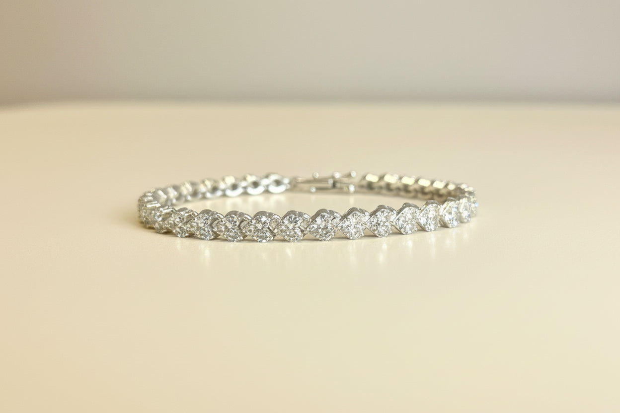 ORENTINI 18K White Gold Plated 7.5in Tripple Tennis Bracelet